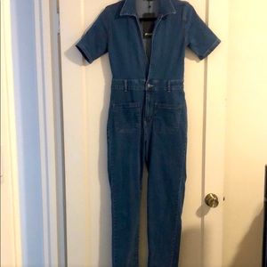 Blue denim women’s jumpsuit-never been worn-size 4